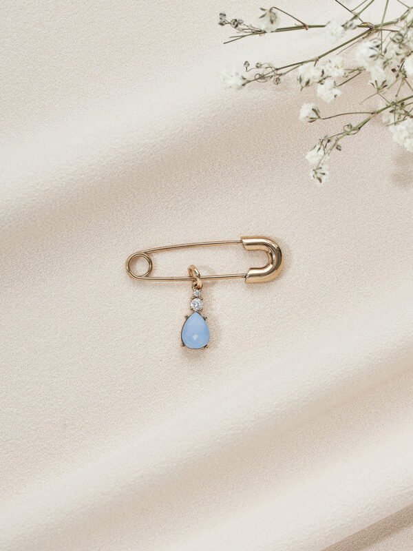 Blue tear-shaped brooch with gold pin, Olive & Piper's Something Blue Pin.